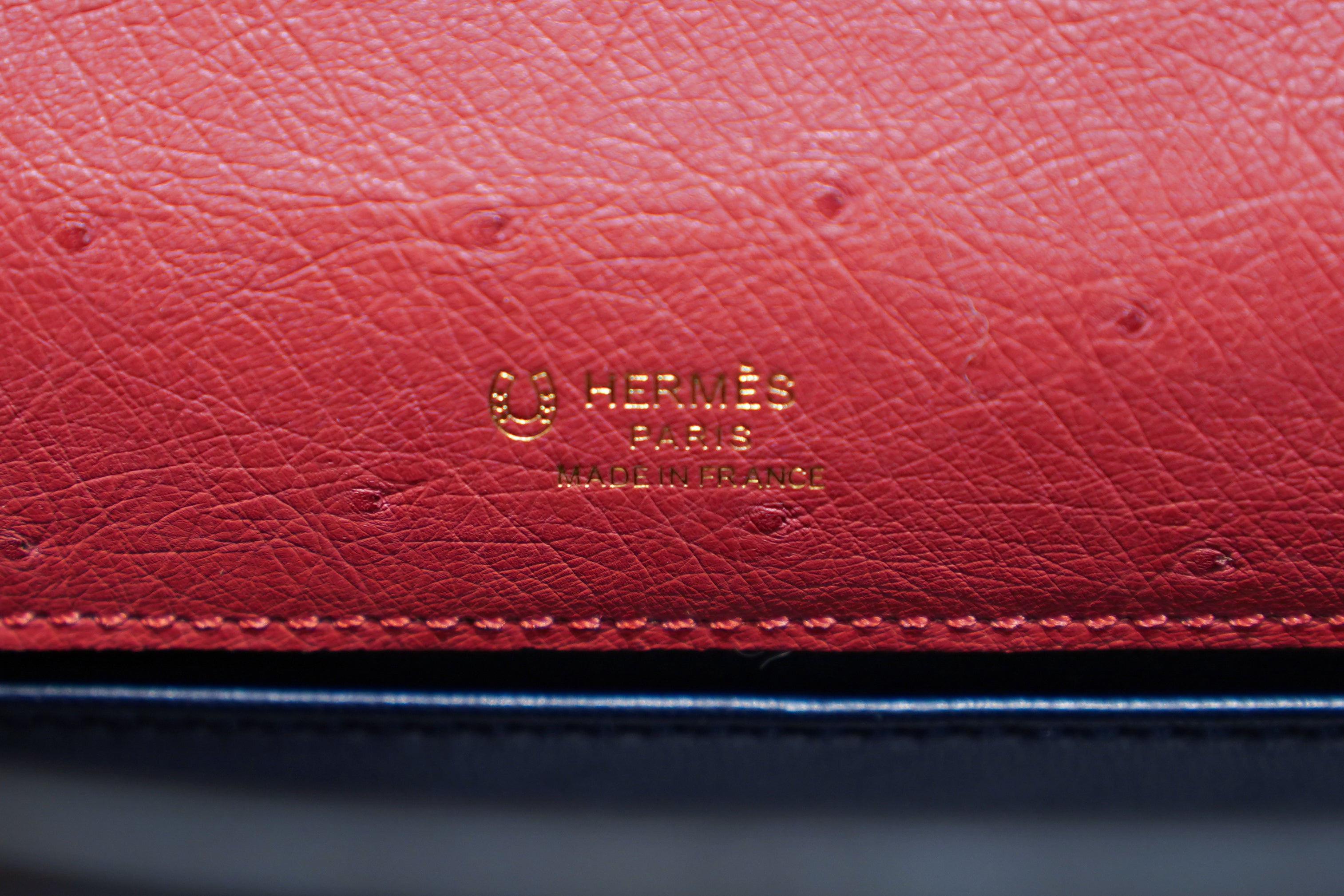 Hermes | Kelly Pochette – Ostrich Leather – Black & Red – Gold Hardware