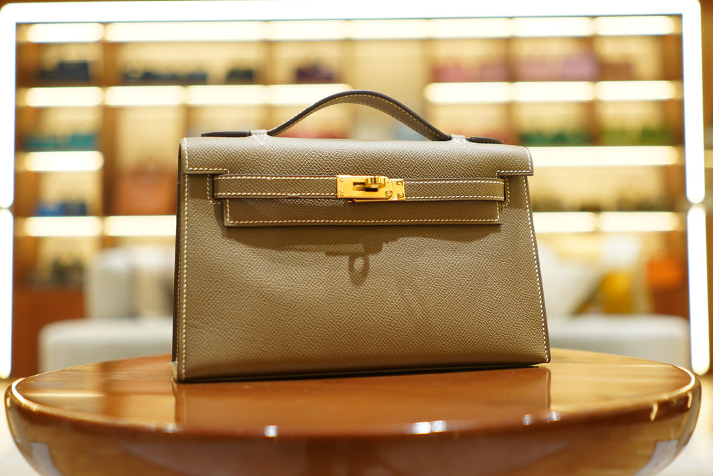 Hermès | Kelly Pochette – Epsom – Grigio – Finiture in Oro