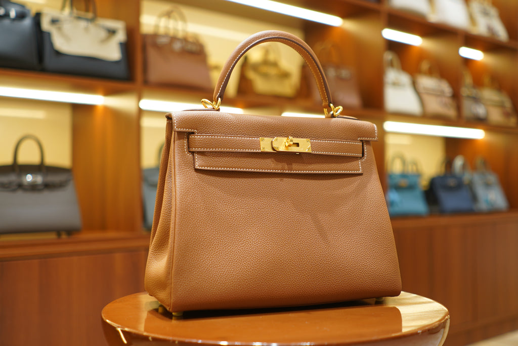 Hermes | Kelly 28 – Retourne – Togo – Gold – Palladium Hardware