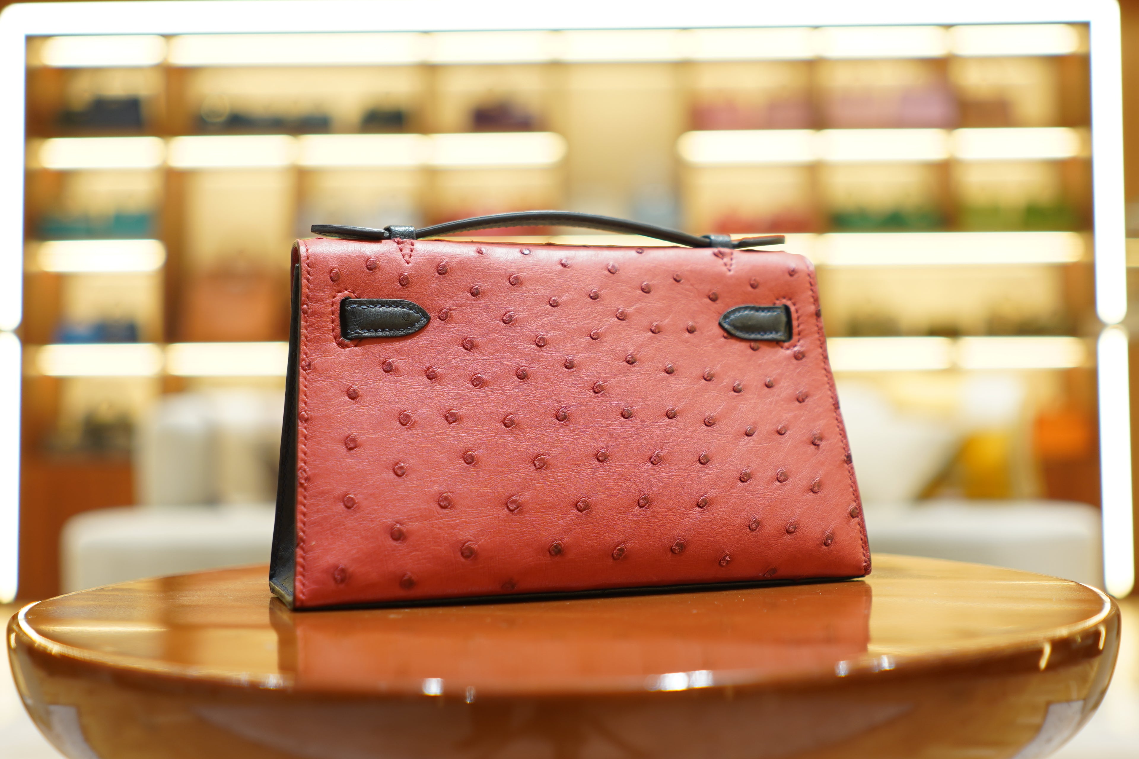 Hermes | Kelly Pochette – Ostrich Leather – Black & Red – Gold Hardware