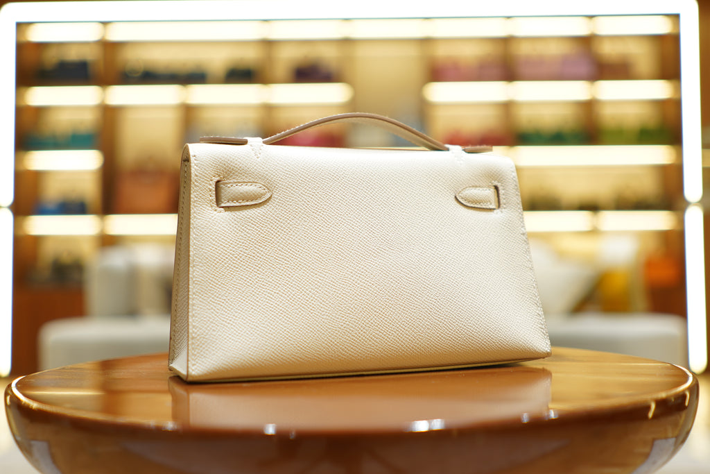 Hermes | Kelly Pochette – Epsom – Creme – Silberne Hardware