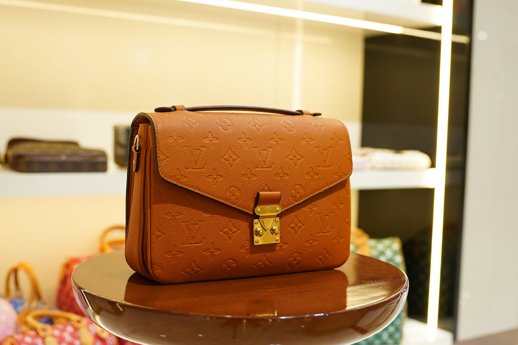 Louis Vuitton | Twist – Epi Leather – Orange – Gold Hardware