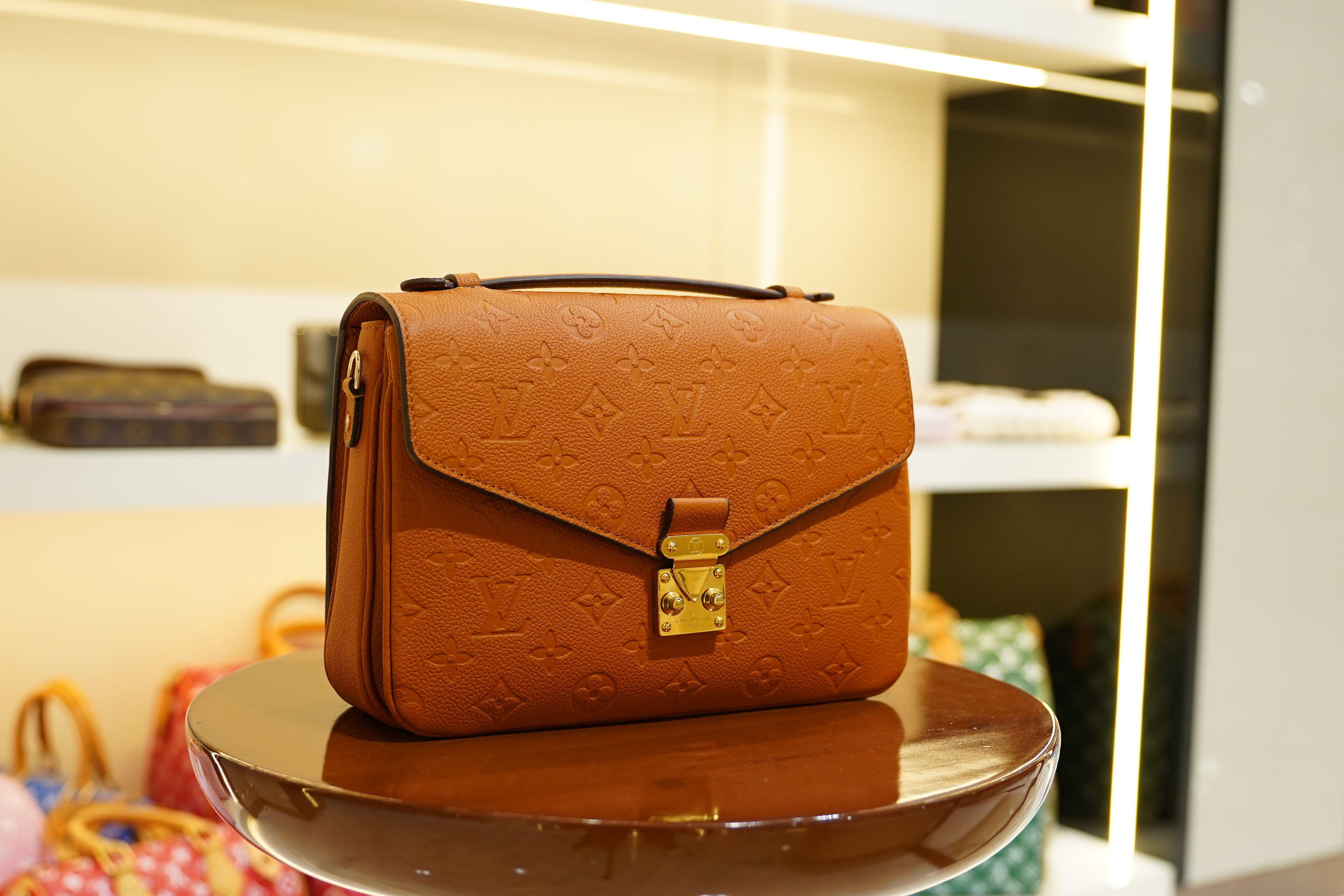 Louis Vuitton | Twist – Epi Leather – Orange – Gold Hardware