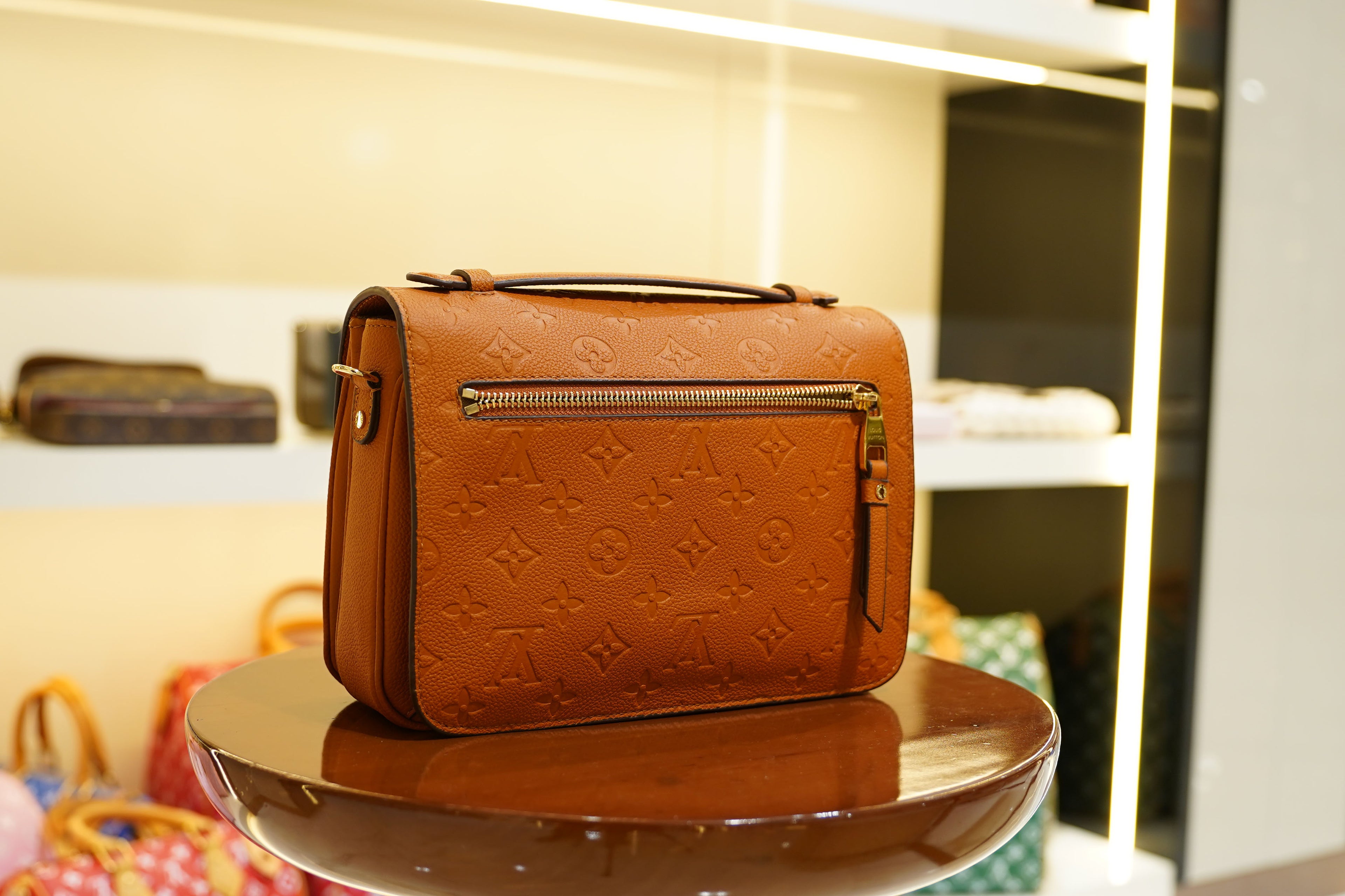 Louis Vuitton | Twist – Epi Leather – Orange – Gold Hardware