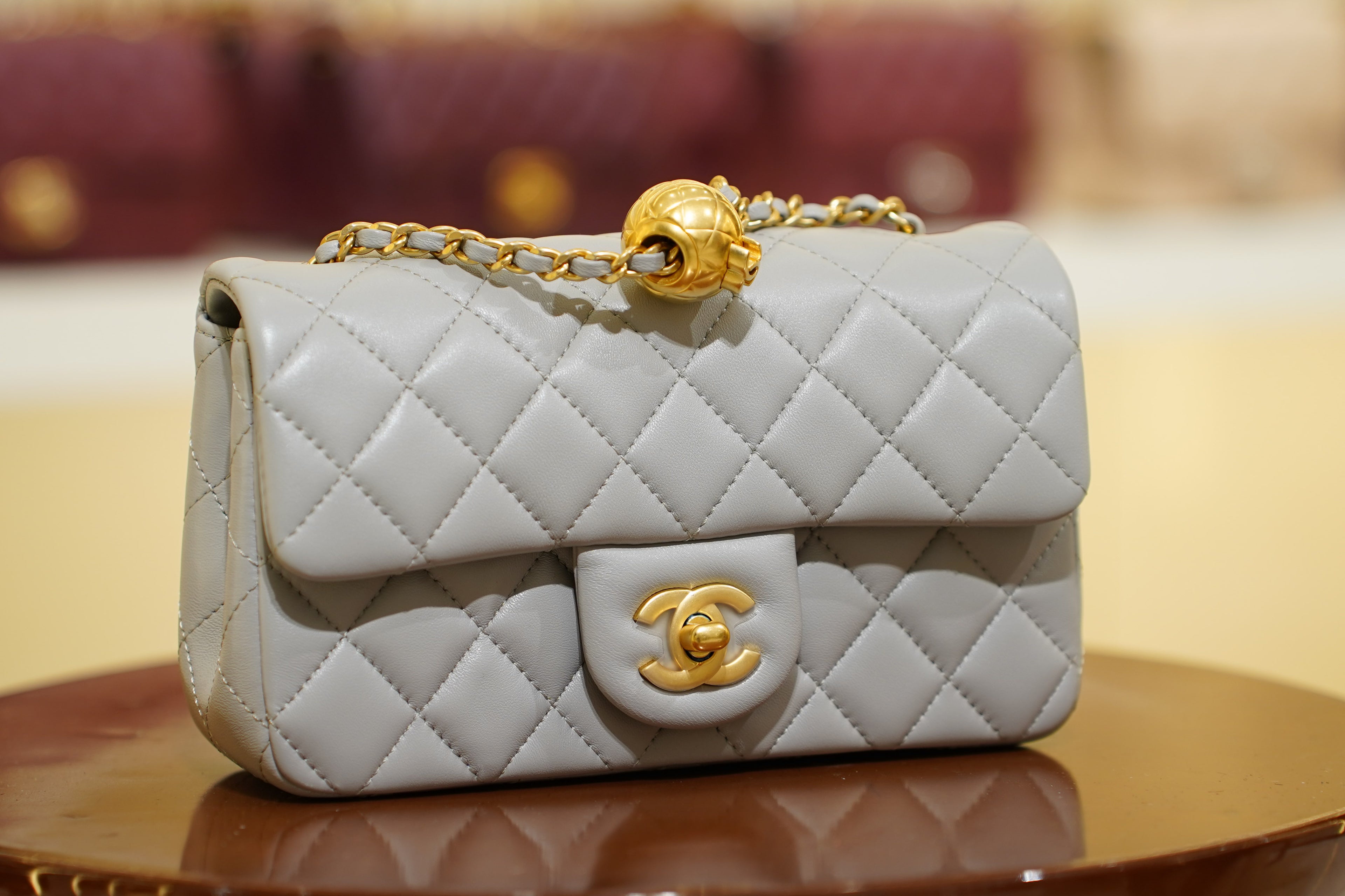 Chanel | Classic Flap Bag with Ball Charm – Light Grey Lambskin – Gold Hardware