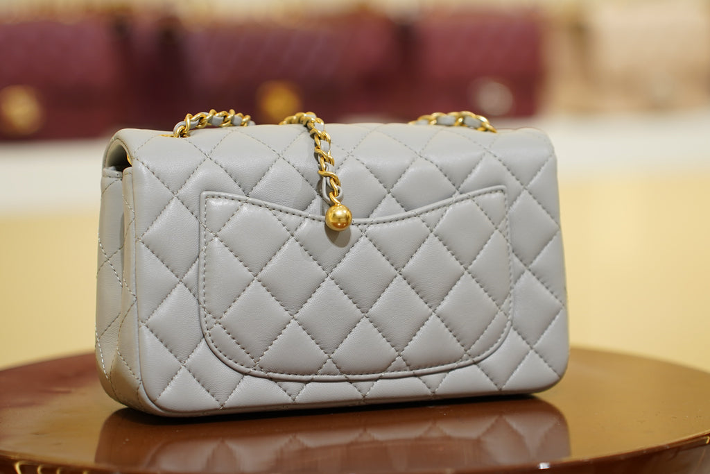 Chanel | Classic Flap Bag with Ball Charm – Light Grey Lambskin – Gold Hardware