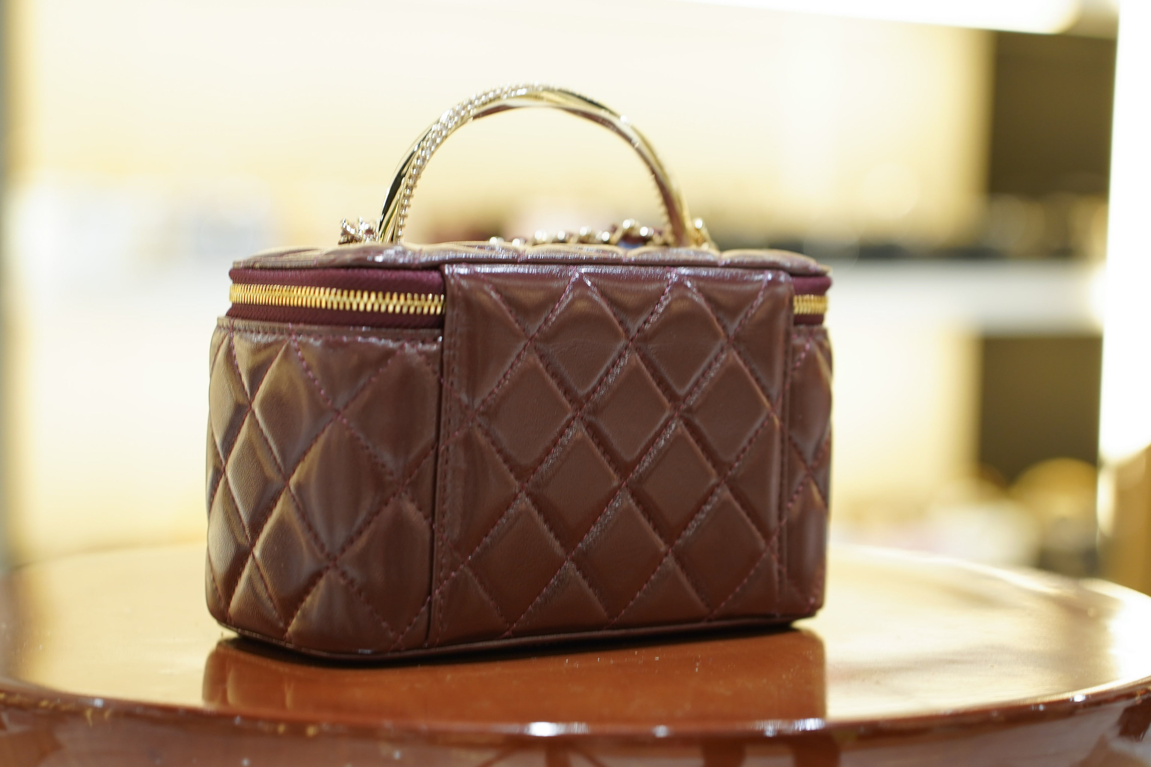 Chanel | Small Vanity Case with Top Handle – Bordeaux Patent Leather – Crystal Gold Hardware