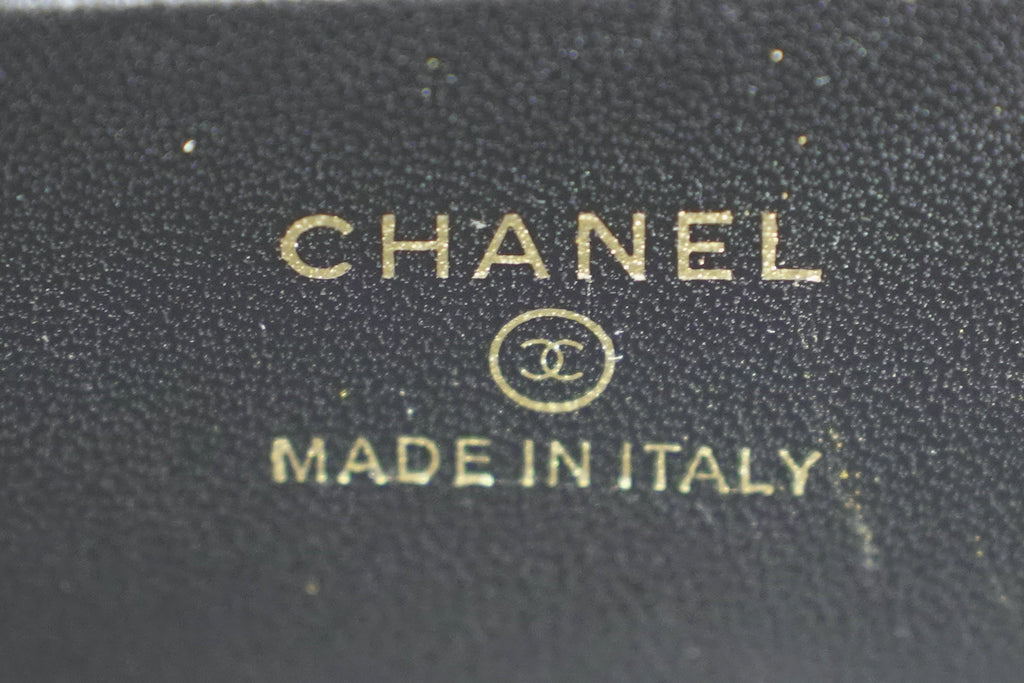 Chanel | Small Vanity Case – Black Lambskin – Beaded Gold CC Logo – Gold Hardware