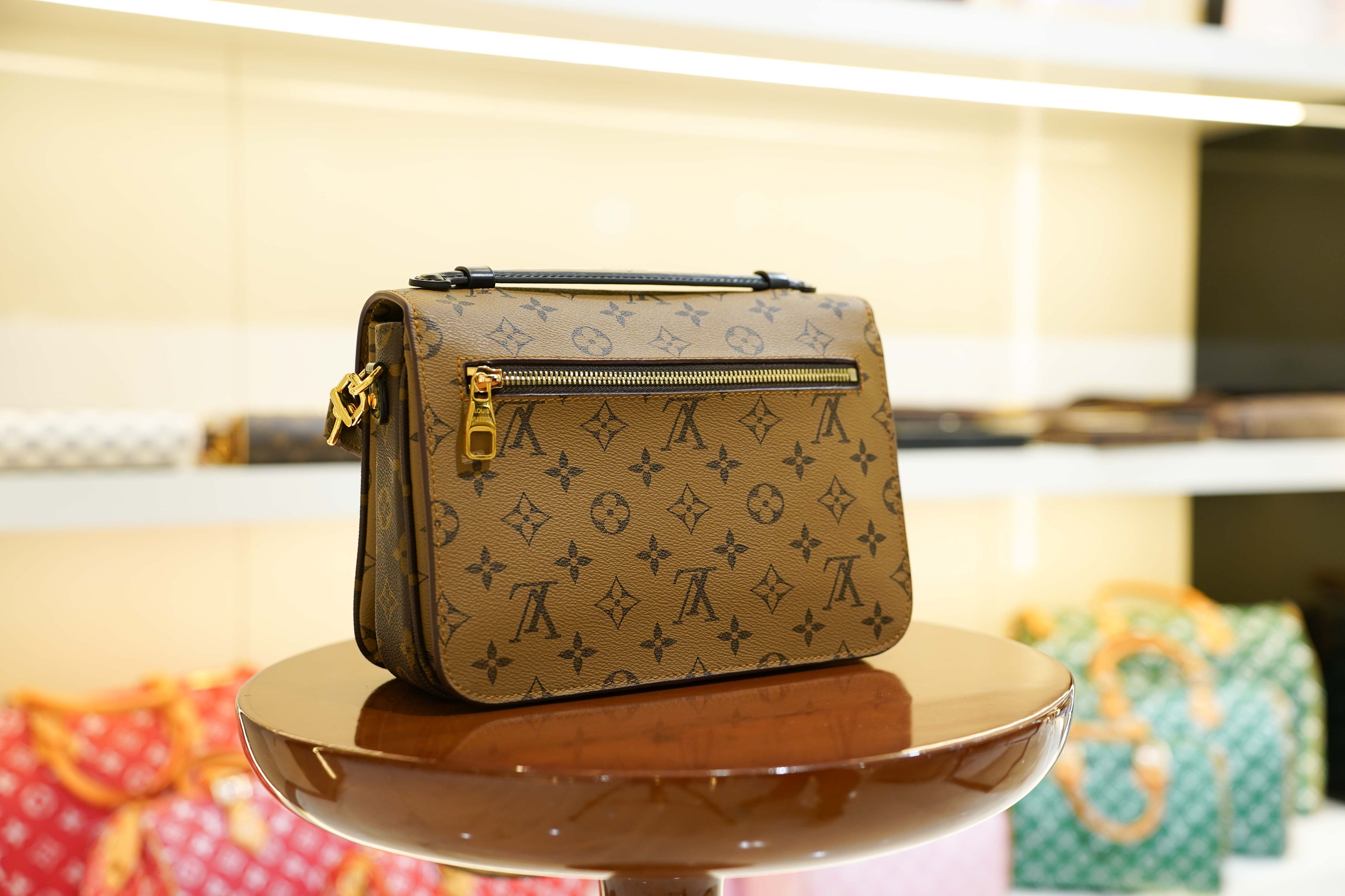 Louis Vuitton | Twist – Canvas – Brown – Gold Hardware
