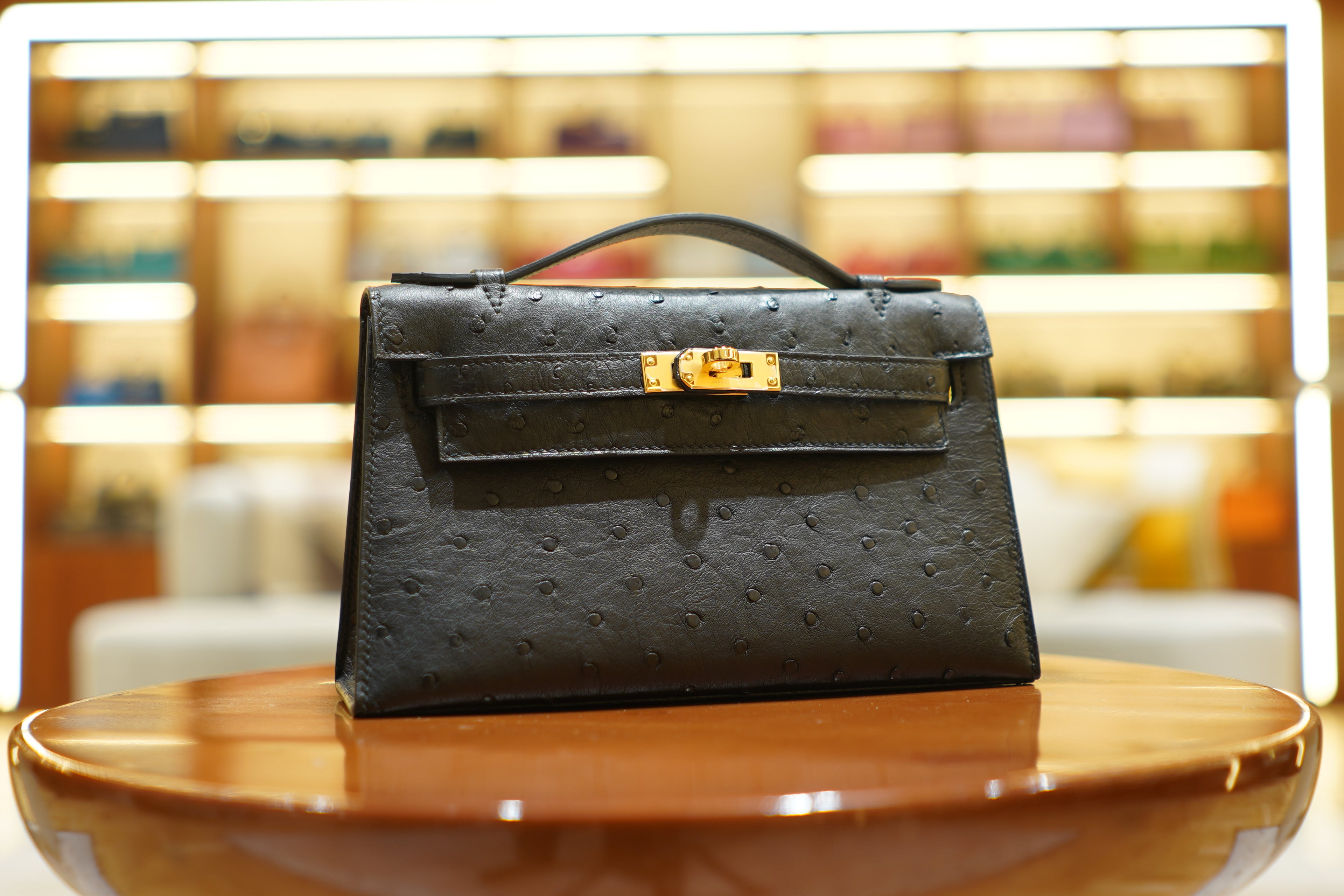Hermes | Kelly Pochette – Ostrich Leather – Black – Gold Hardware